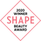 Weiß-rosanes rautenförmiges Abzeichen mit der Aufschrift „2020 Winner SHAPE BEAUTY AWARD“ in rosaner und schwarzer Schrift.